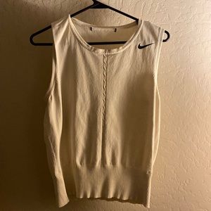 Small business made. Cream color cardigan. Nike  logo.